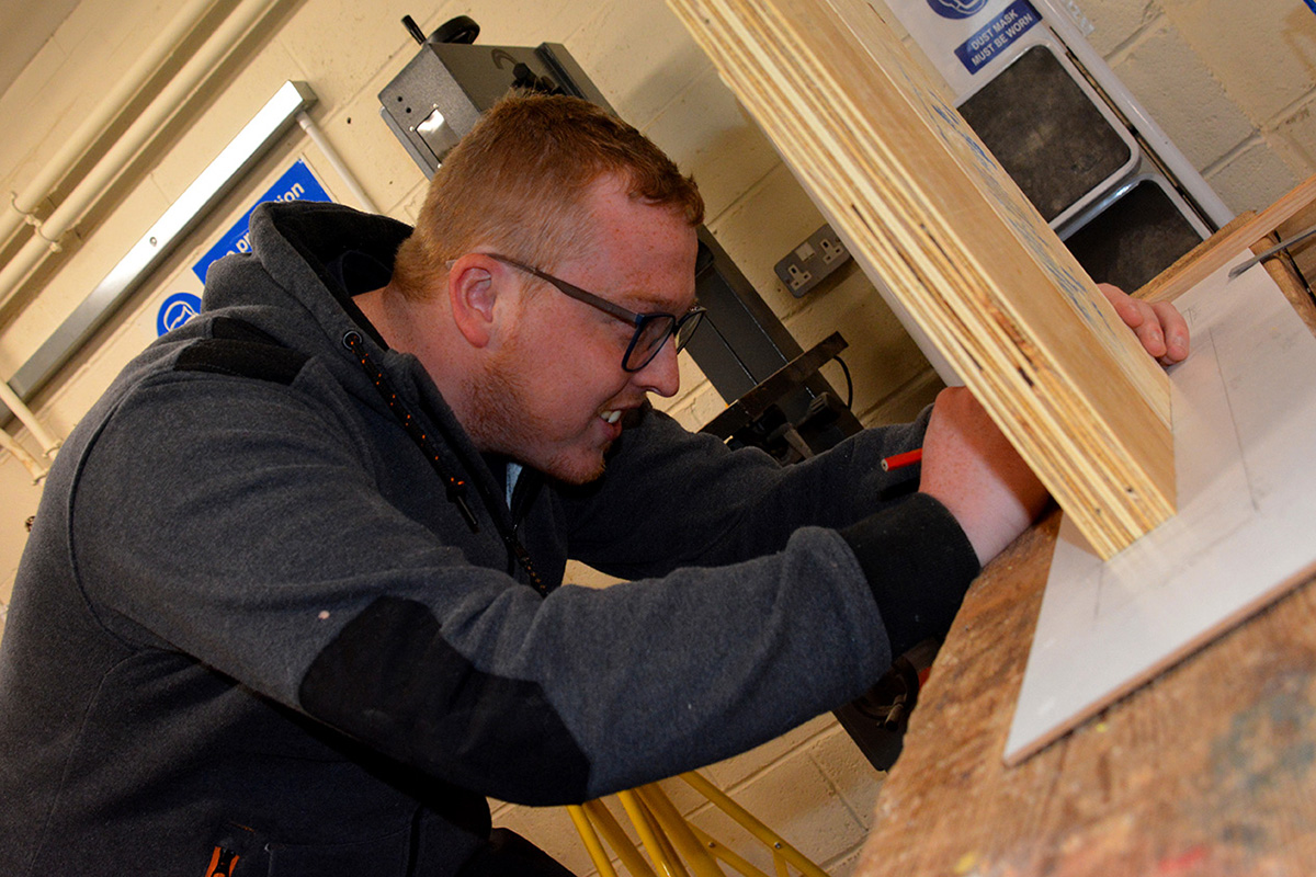 Learner practising woodwork