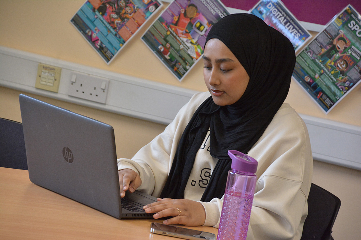 Learner using a laptop