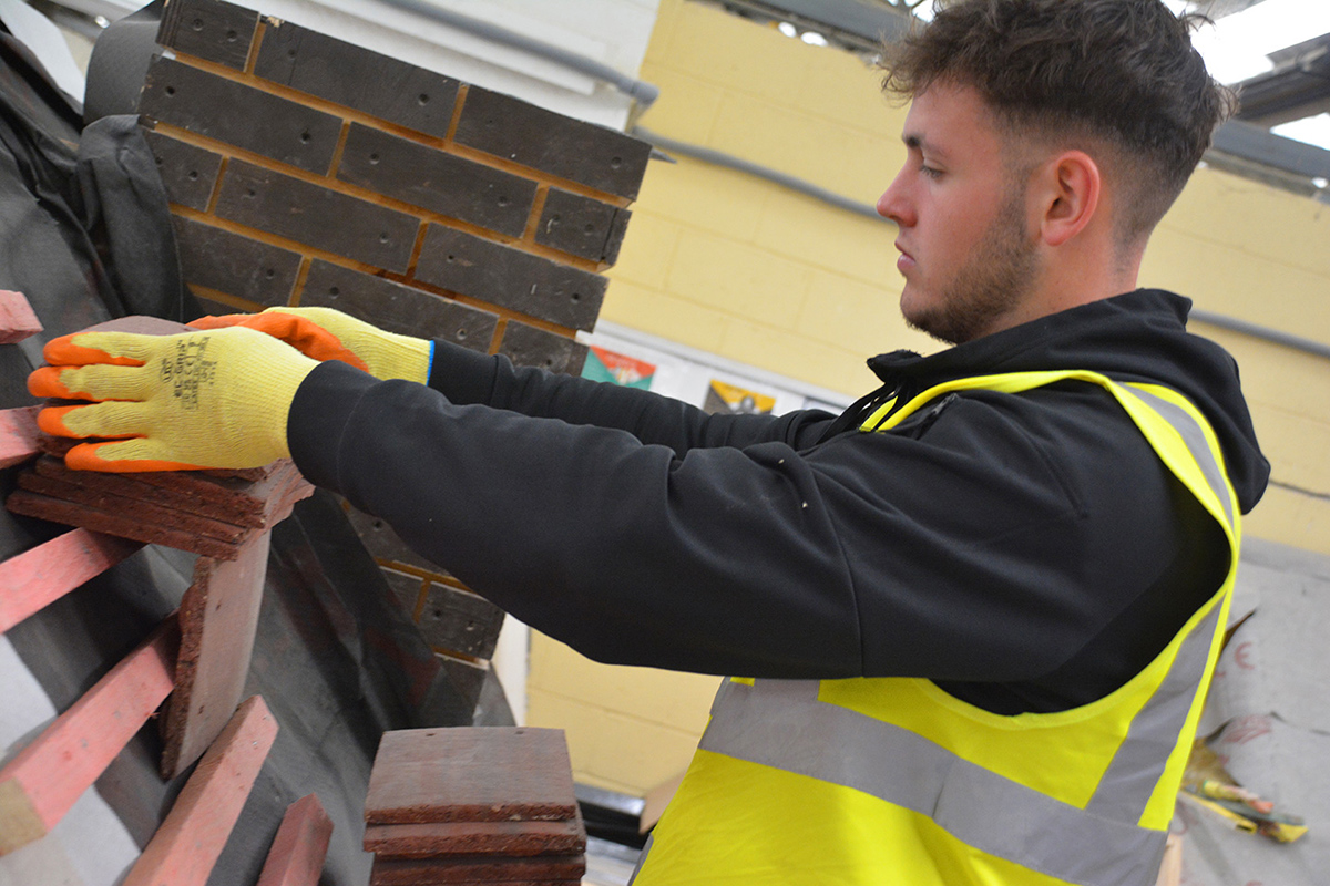 Learner practising roofing