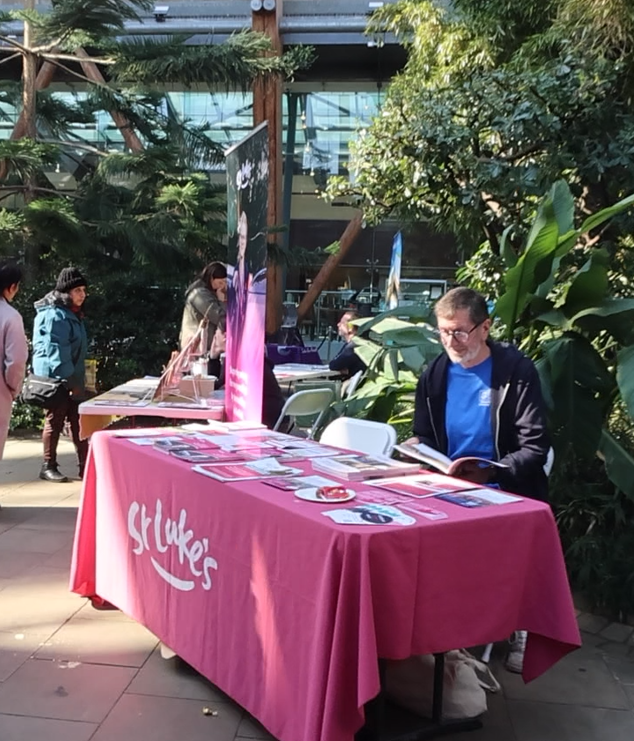 Man sat at a desk in the winter gardens