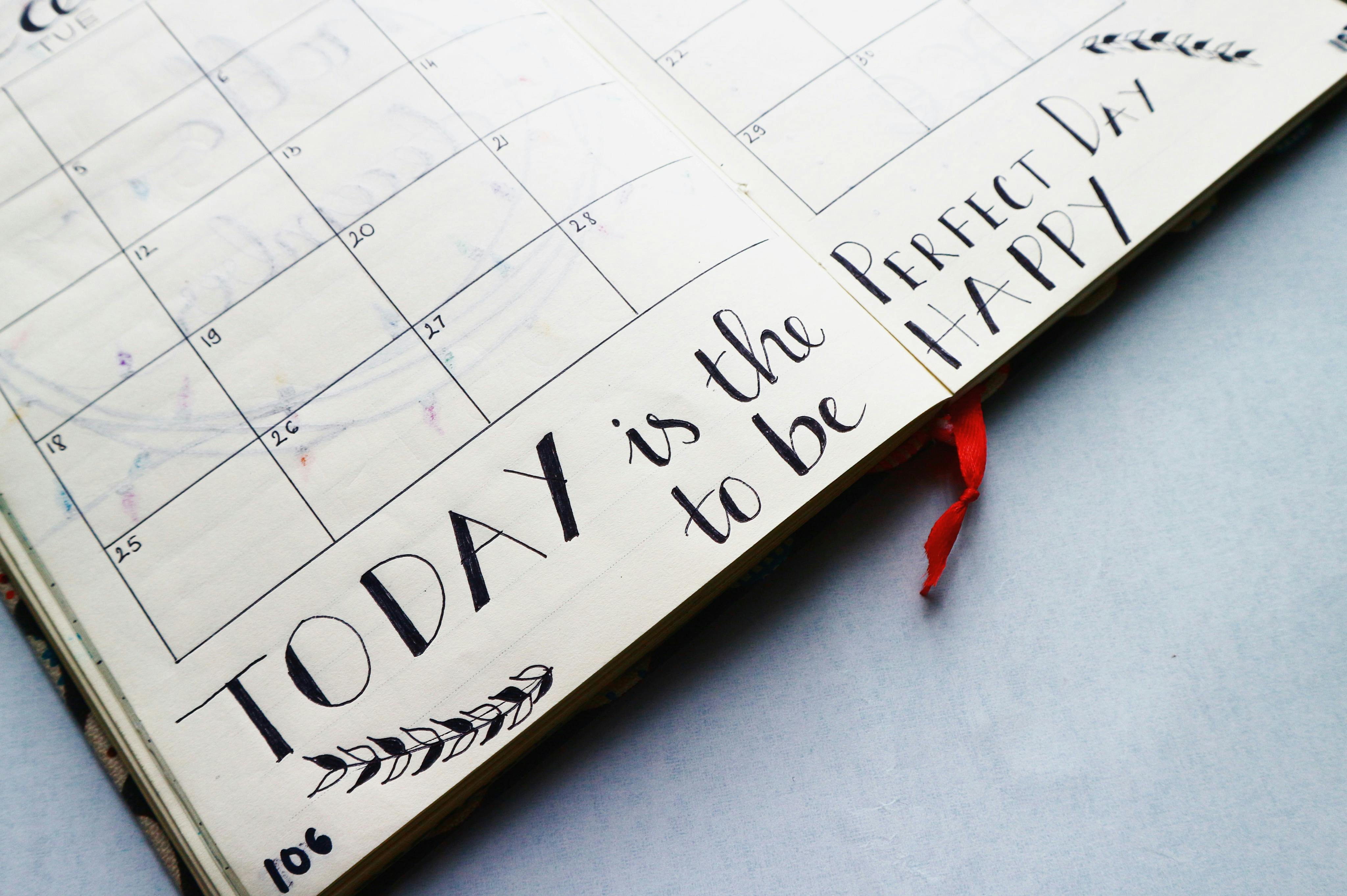 Generic Blank Calendar with quoting "Today is the perfect day to be happy" 
