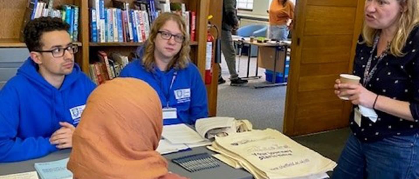 Learners and tutors at an information session