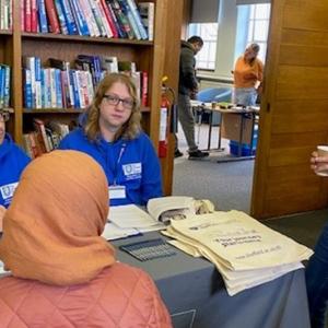 Learners and tutors at an information session